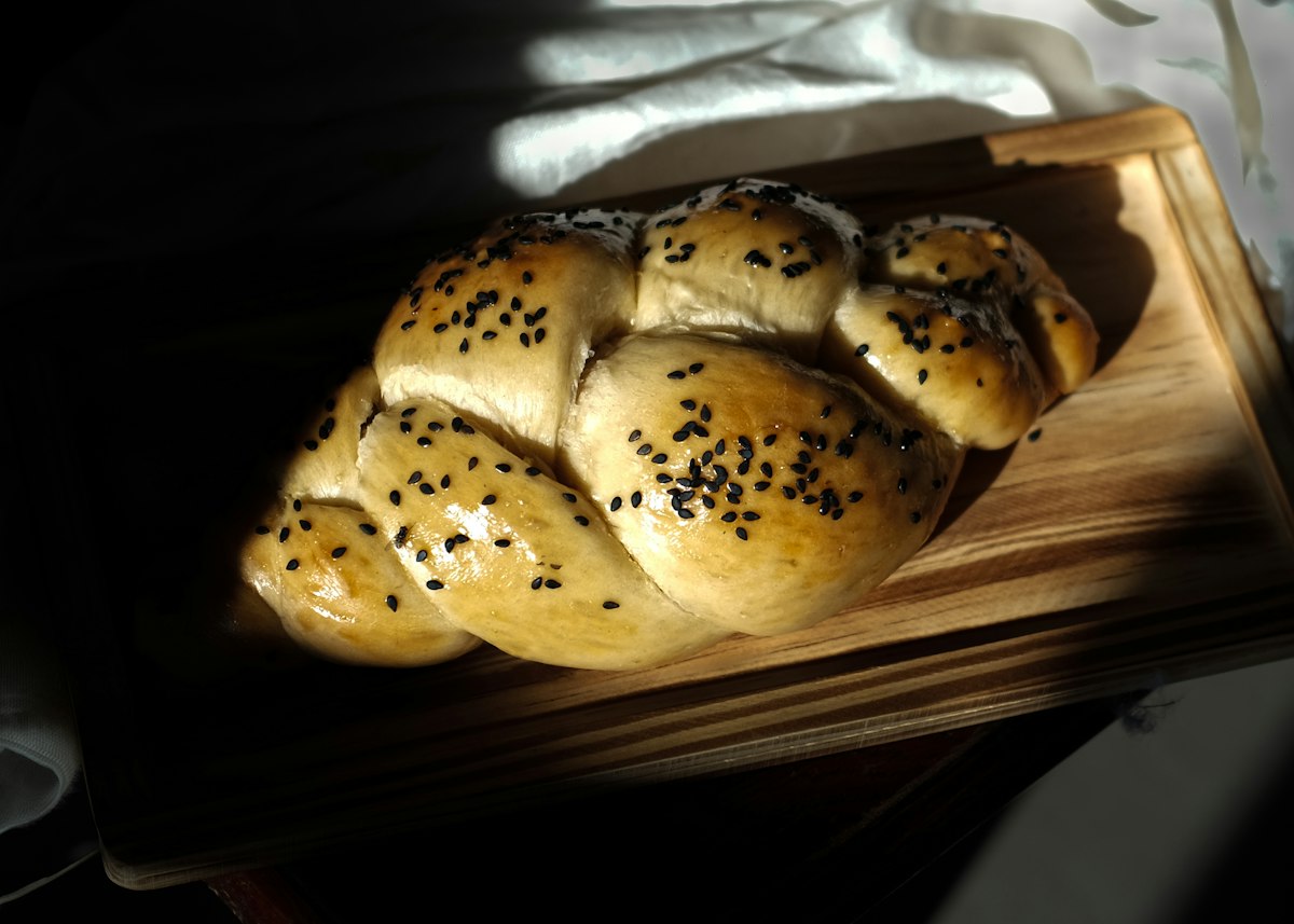Braided challah on a board
